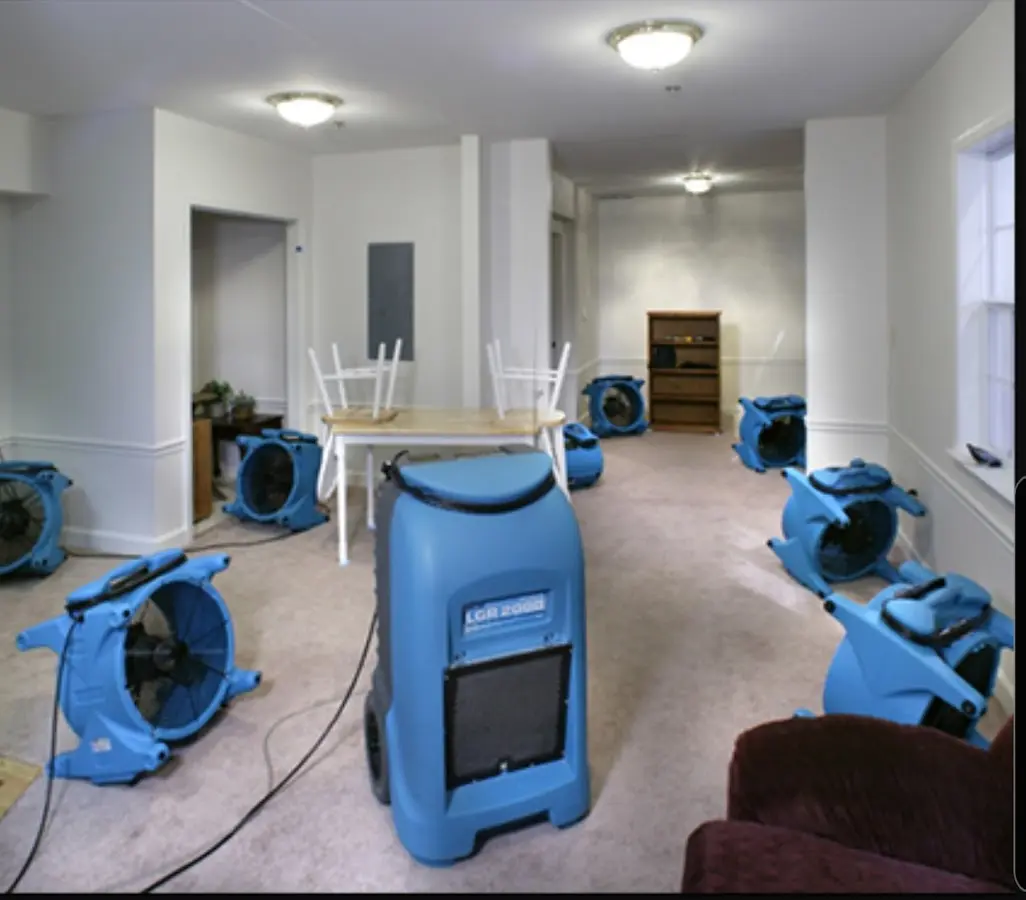 Air movers and dehumidifier setup for Water Damage Restoration in West Miami